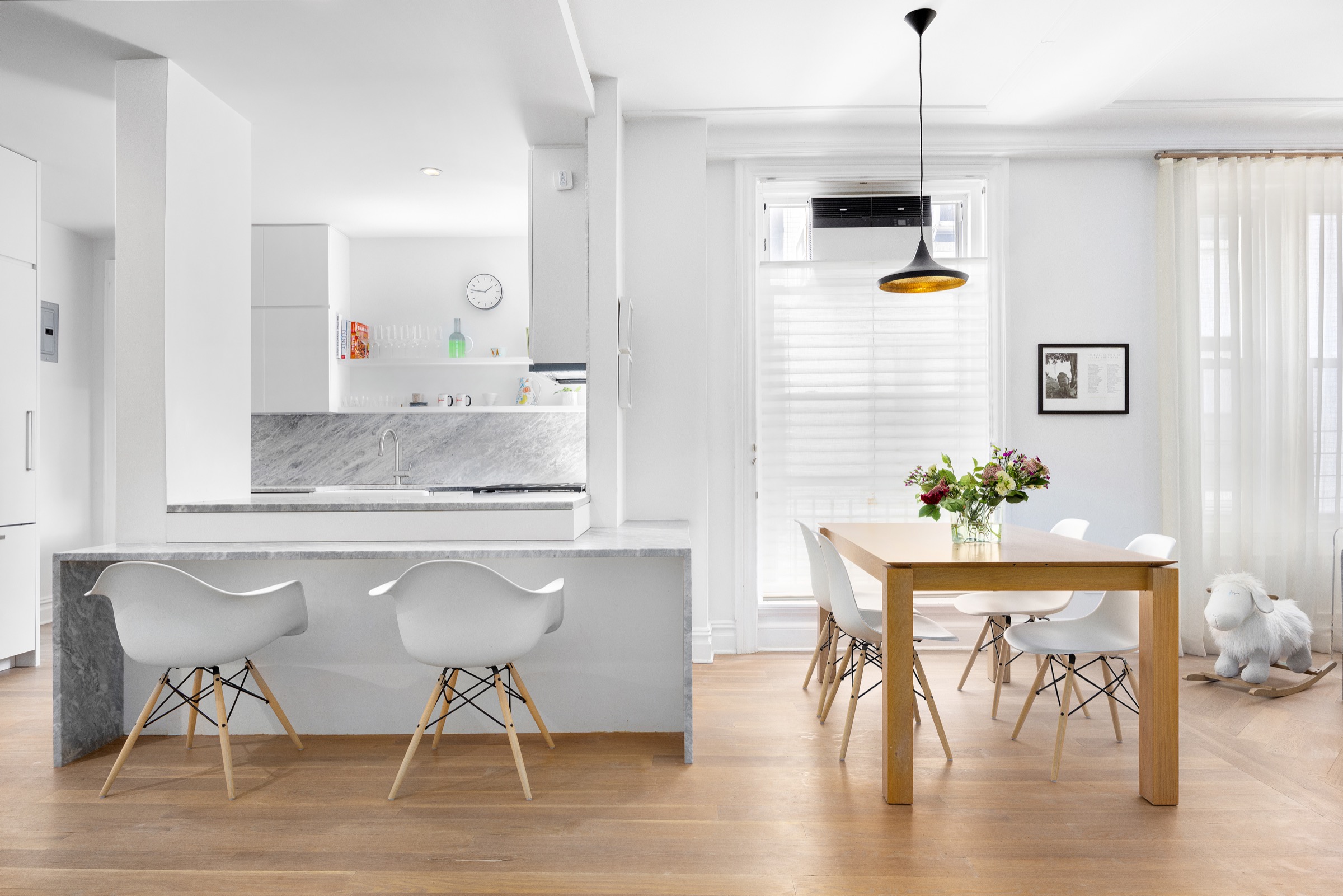 Open dining area and kitchen in warm light