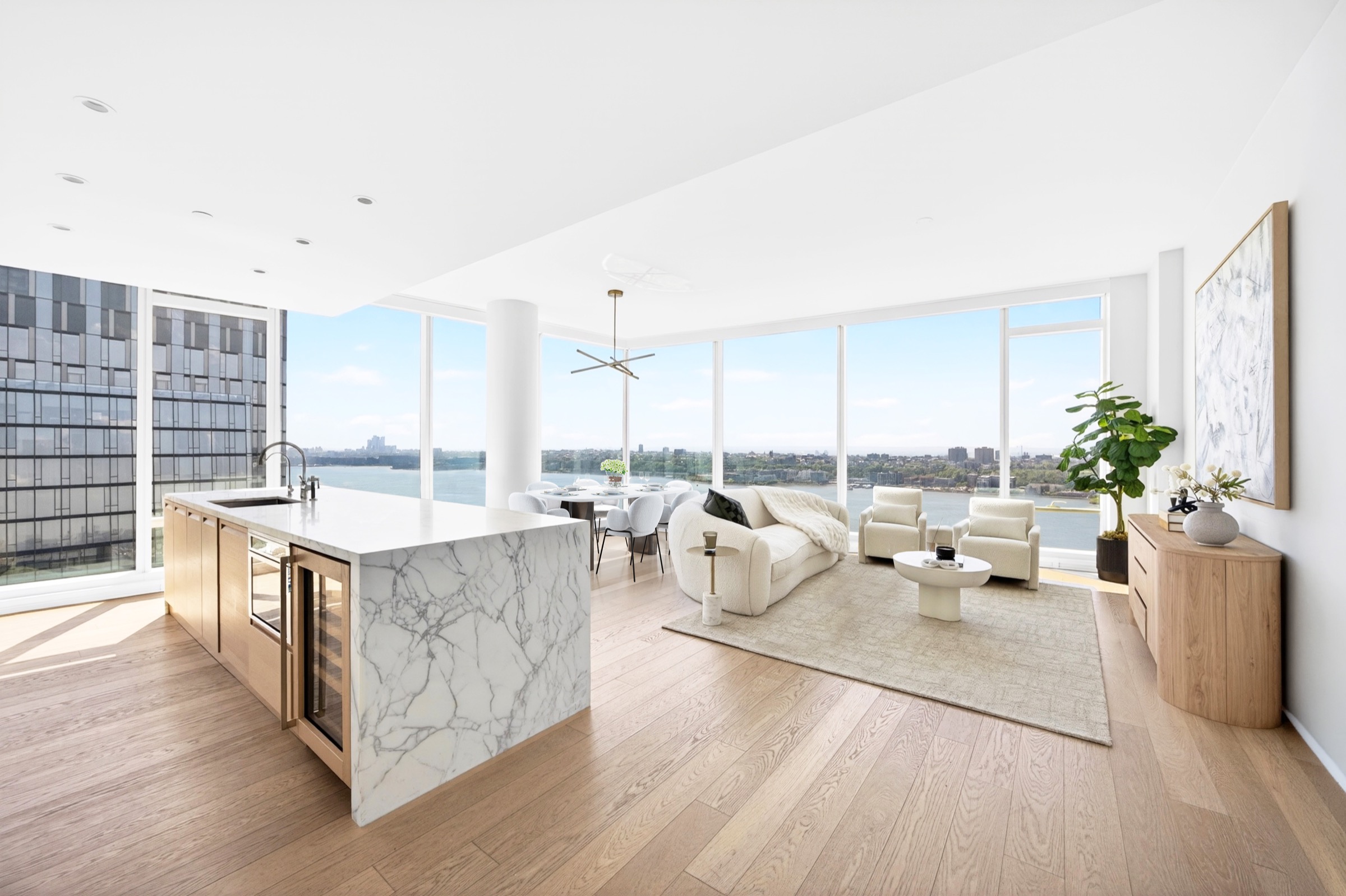 Corner living room over the Hudson at dusk