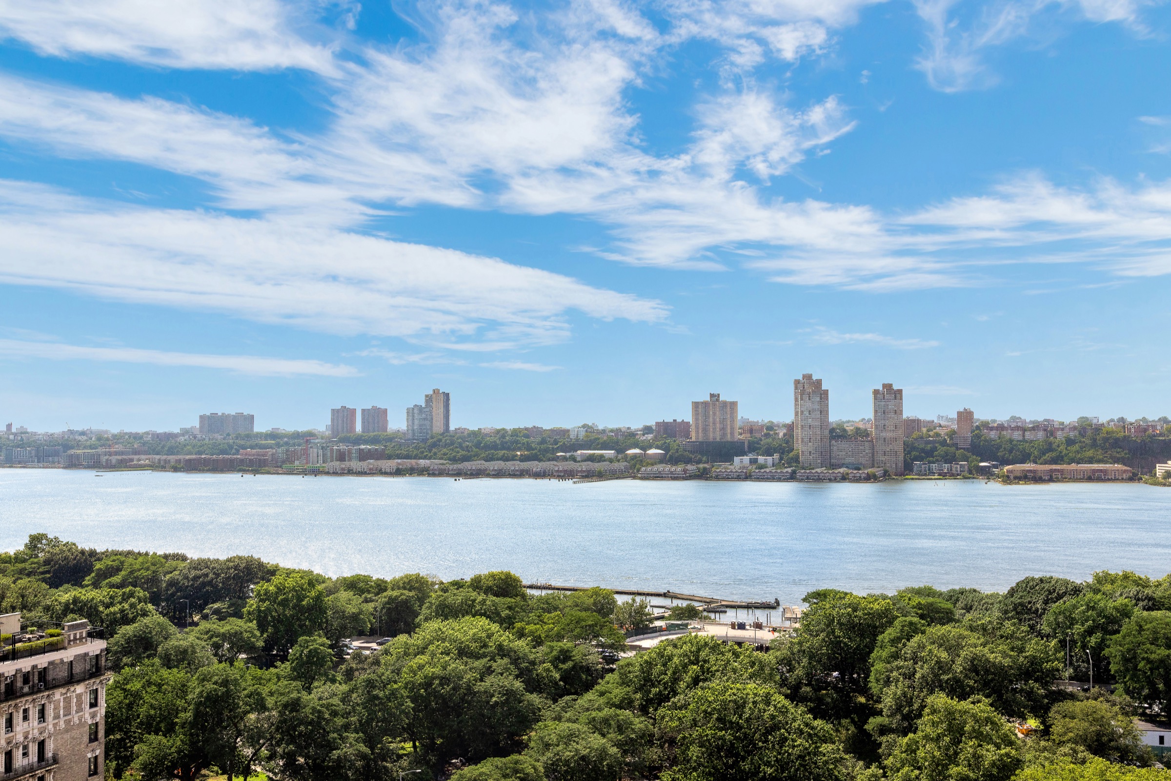 Daytime view over the Hudson River from a high floor